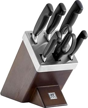 Zwilling Four Star 7pc Knife Block Set. Forged Special Formula stainless steel. Ice-hardened. Ergonomic handle. Set: 4 kitchen knives, honing steel, self sharpening block +shears. Made in Germany on Amazon.ae - Price Tracker
