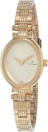 Titan Women's Quartz Analog Watch | Oval Champagne Dial with Gold Stainless Steel Strap | Crystal Accented Markers | Wedding & Festive Wear - 2535YM01 on Amazon.ae - Price Tracker