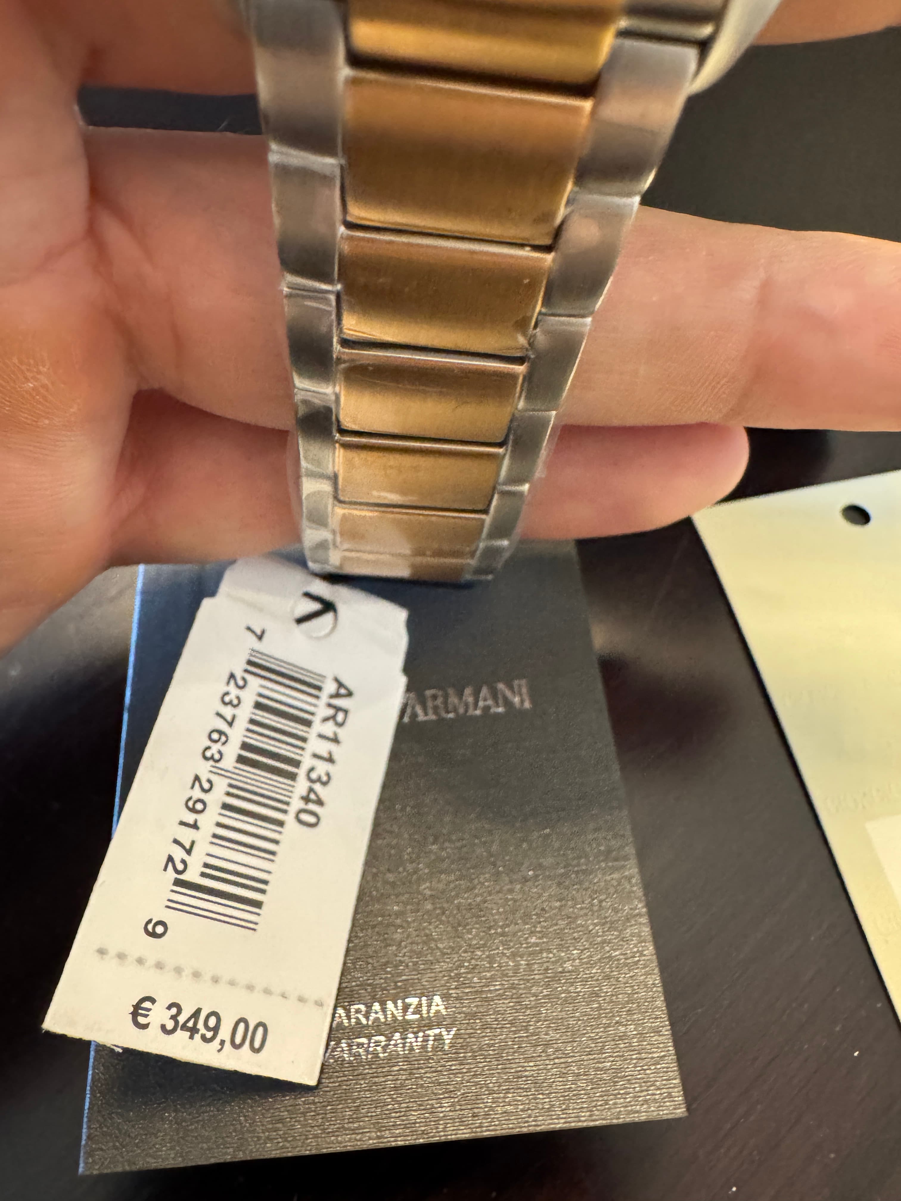 Emporio Armani AR11340 two-tone stainless steel bracelet with original price tag and warranty booklet