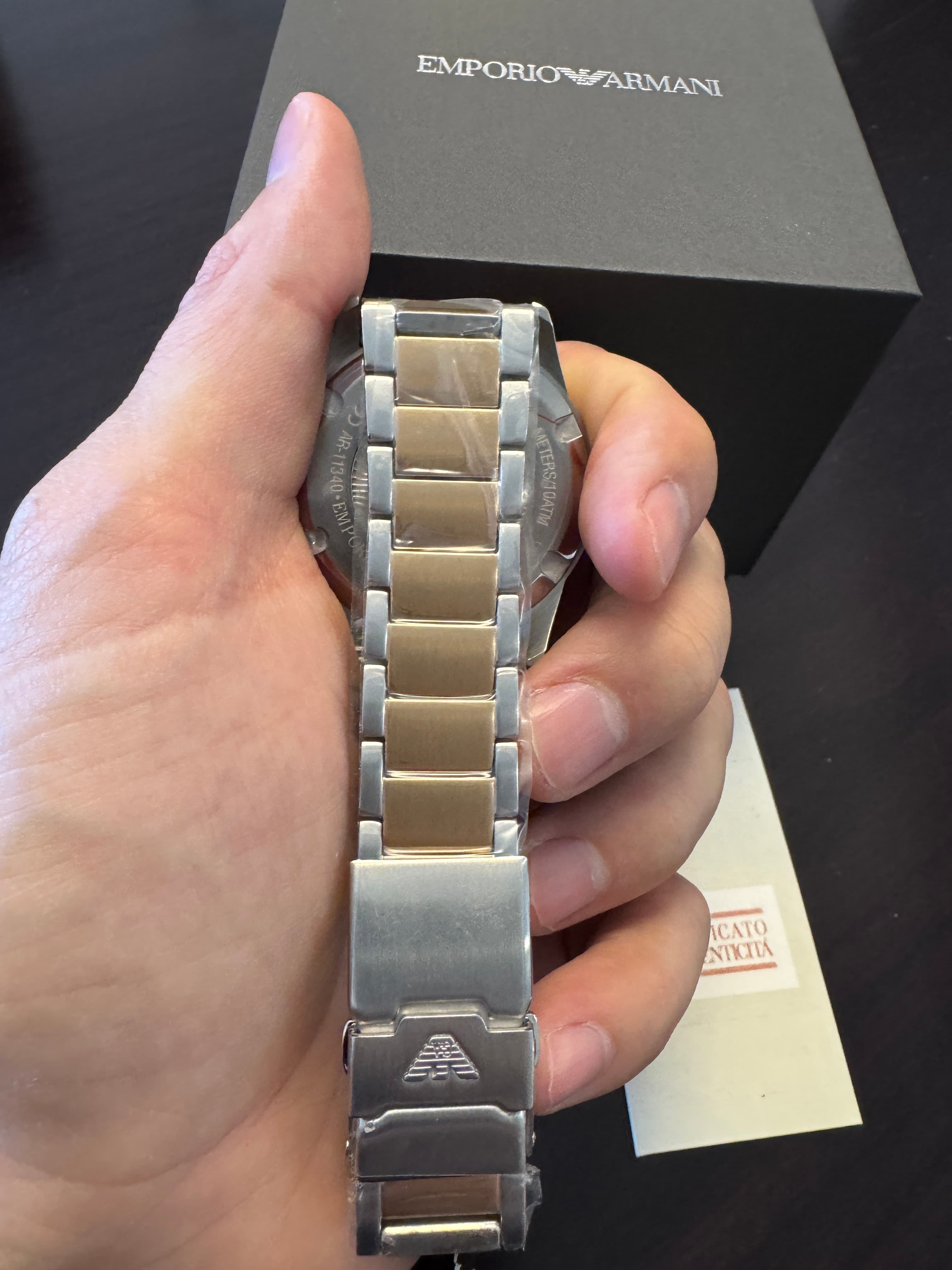 Emporio Armani AR11340 case back and fold-over clasp engraved with the Emporio Armani eagle