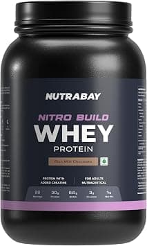 Nutrabay Pro Nitro Build Whey Protein Powder - 1kg, Milk Chocolate | 30g Protein, 3g Creatine, 6.6g BCAA | Easy to Digest | NABL Lab Tested | Muscle Growth & Recovery | Gym Supplement for Men & Women on Amazon.ae - Price Tracker